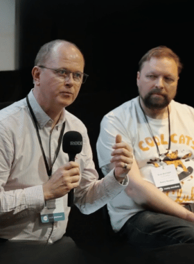 A panel on AI in retail with speakers from Relewise, Rusty Monkey, and retail partners.